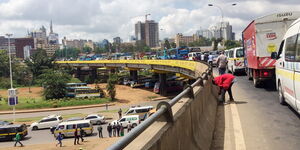Motorists and pedestrians pictured at Globe Round-About in Nairobi on November 11, 2019