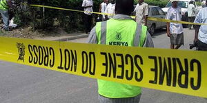 A Kenyan Police Officer at a crime scene