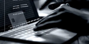 A sillhoute of a hacker using a computer.jpg
