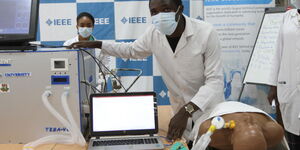 A student conducts a demonstration of the prototype during the launch of the locally assembled ventilator on April 12, 2020.