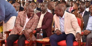 Deputy President Rigathi Gachagua and President William Ruto engaging in talks during an event on March 15, 2023.