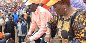 Nominated Senator Getrude Musuruve (far right) dances at a past campaign rally alongside ODM leader Raila Odinga