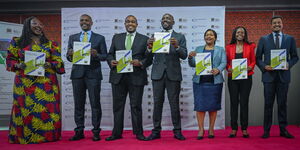 Transport Cabinet Secretary Kipchumba Murkomen alongside government officials and e-mobility task force members during the launch of the policy on March 27, 2023, at KICC.