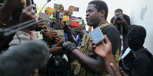 Haiti gang leader Jimmy Cherizier alias Barbecue addressing the press 