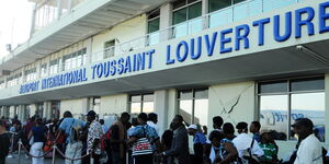 Haitian citizens wait for flights outside Toussaint Louverture International Airport