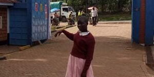 Janet Kerubo Otwori outside Kereri Girls in Kisii County