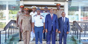 Defence Cabinet Secretary Aden Duale together with the Chief of Defence Forces (CDF) General Francis Ogolla (standing next to Duale in military uniform) and other military officials on March 8, 2024.
