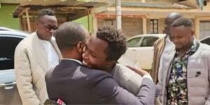 Kimani Mbugua hugs one of his friends as Oga Obinna picks him up on May 16, 2024