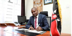 Interior Ministry CS, Kithure Kindiki  signs documents in Transnzoia County on March 18