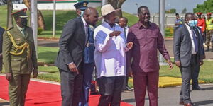 President Yoweri Museveni of Uganda, Transport Cabinet Secretary Kipchumba Murkomen and former Prime Minister Raila Odinga at JKIA on May 17, 2024.