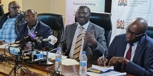 SME CS Simon Chelugui (centre) speaking during the launch of   the National Organizing Committee for 23rd EAC MSMEs Trade Fair on Wednesday November 1, 2023  