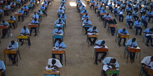 A file image of Kenyan high school students sitting for exams.