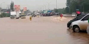 Vehicles wade through floods on Thika Superhighway on May 1, 2024