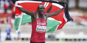 Kenyan middle races champion Emmanuel Wanyonyi celebrates after winning a race in a past championship.