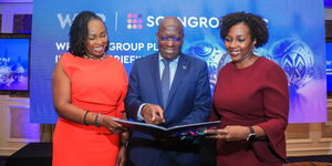 WPP Scangroup PLC Chief Executive Officer Patricia Ithau (left) and WPP Scangroup Board Chair Richard Omwela (right) peruse through the 2023 Financial Results report during WPP Scangroup’s investor briefing event.