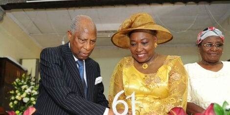 An image of Retired Ambassador, the late Nicholas Mugo and his wife, Beth Mugo, cutting a cake during their 61st marriage anniversary in September 2019.