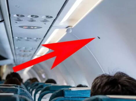 A file image of the small black triangle on the plane located above the window