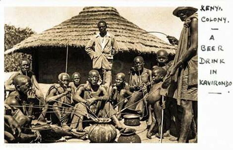 Undated image of Kavirondo men communally enjoying traditional brew