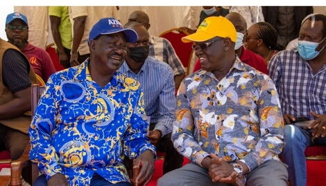 Former Prime Minister Raila Odinga (left) and Meru Governor Kiraitu Murungi at Maua Stadium on Thursday, March 10, 2022.