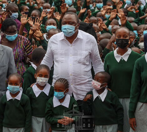 An undated image of President Uhuru Kenyatta with pupils from Westlands Primary School.