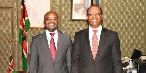 Interior PS Raymond Omollo and former Interior PS Karanja Kibicho and during a hand over ceremony at Harambee House on Monday, December 5, 2022.