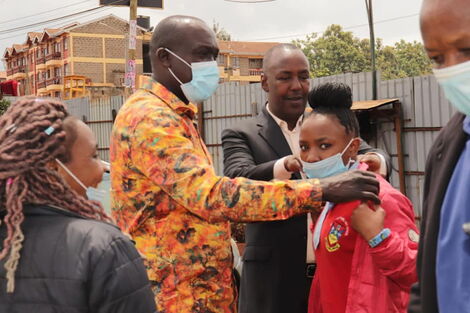 Kariri Njama during a meeting with the family of the recipients of Form One sponsorship