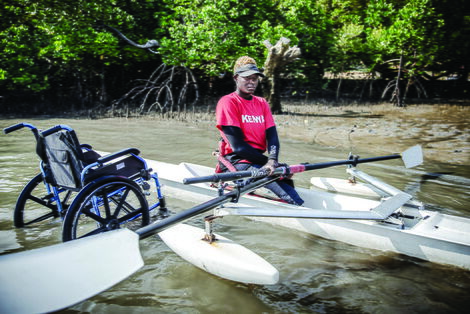 Kenyan para-athlete Asiya Mohammed row a boat during training in Mombasa