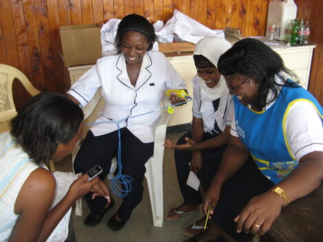 Undated Photo of Nurses Engaging in a Conversation 