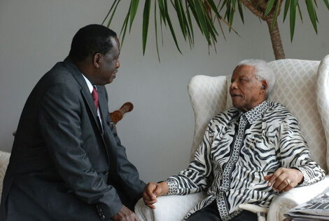 ODM leader Raila Odinga with the Late Nelson Mandela.