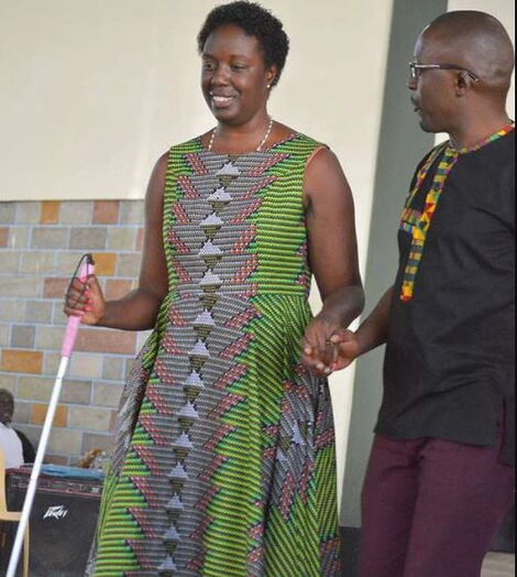 Raila Odinga's daughter Rosemary assisted to walk after she lost her eyesight.