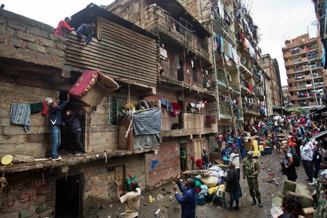 Residents pictured in semi-complete apartments in Nairobi.