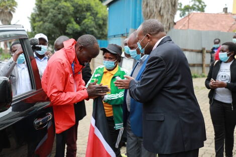 Ferguson Rotich Together with Kericho Governor Paul Chepkwony on Wednesday August 11