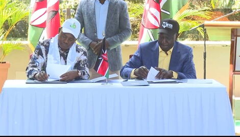 Speaker Justin Muturi and Deputy President William Ruto signing a coalition agreement on Saturday April 9, 2022