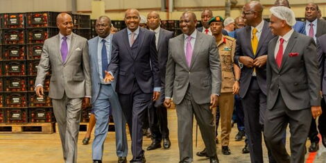 Trade CS Moses Kuria and President William Ruto during the launch of Twiga Foods Distribution Centre at Tatu City on Monday, November 28, 2022.