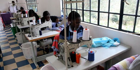 Workers at a Nairobi- based textile factory.