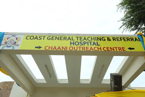 A signpost showing the Coast General Teaching and Referral Hospital