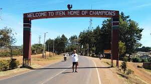 A runner posing behind the famous landmark in Iten, Rift Valley Region