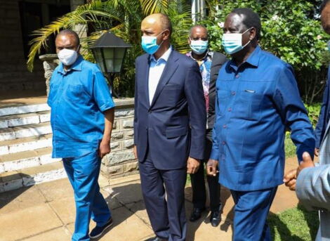 Raila Odinga (right) with Peter Kenneth 