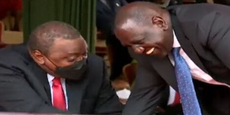 President Uhuru Kenyatta and deputy William Ruto share light moment during the Mashujaa Day celebrations on Wednesday, October 20.