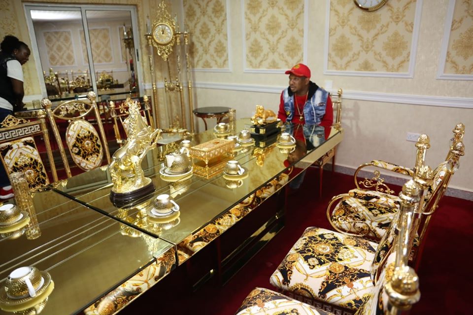 Nairobi Governor Mike Sonko overlooks a set-up table made of golden sculptures on Sunday, December 1, 2019.
