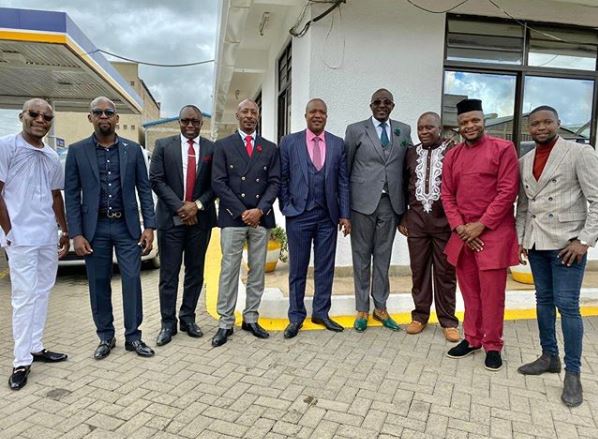 Comedian Jalang'o poses for a photo with some of the people who attended his wedding.