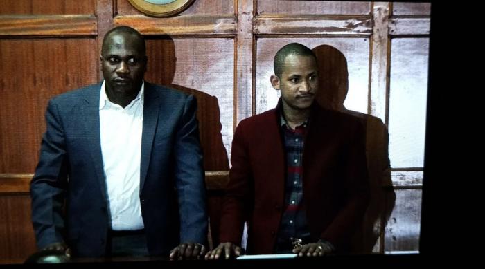 Embakasi East MP Babu Owino appearing in court alongside his bodyguard Fanuel Owino in January 2018