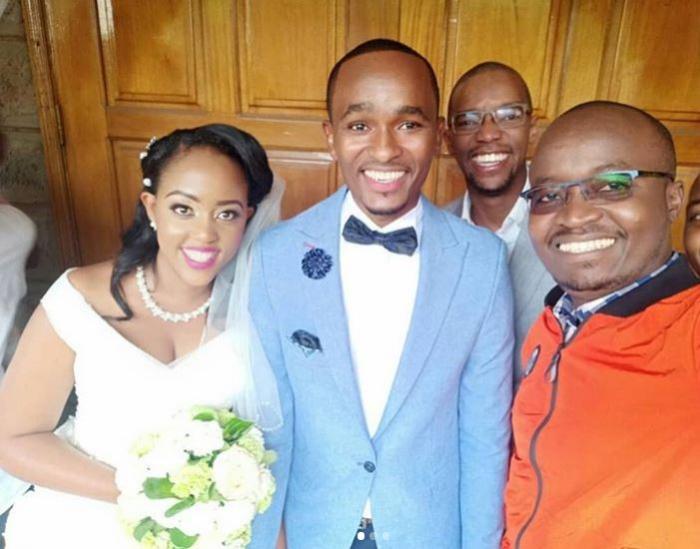 Sam Gituku (in blue suit) with his bride Ivy Waitherero and guests Mac Otani and Waihiga Mwaura.