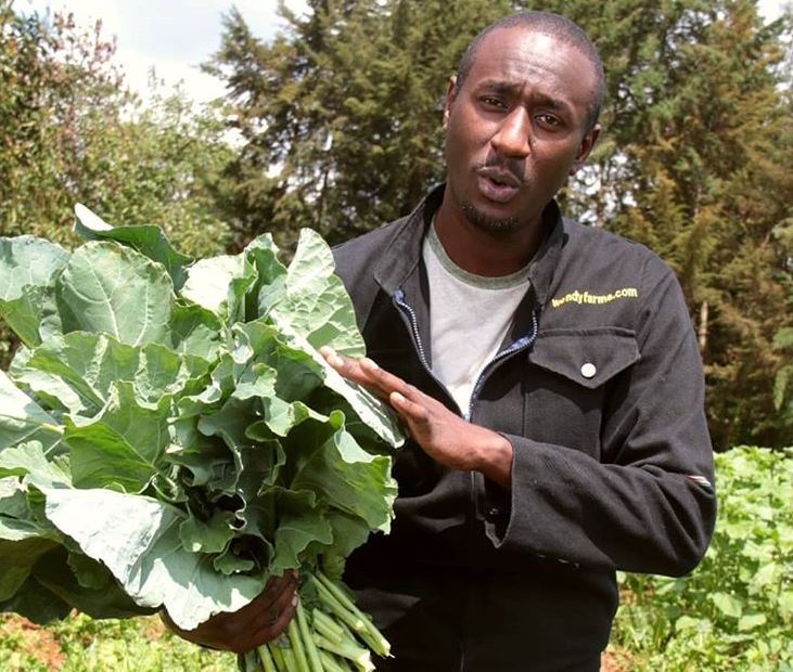 Former K24 TV journalist Caleb Karunga holding some of his produce.