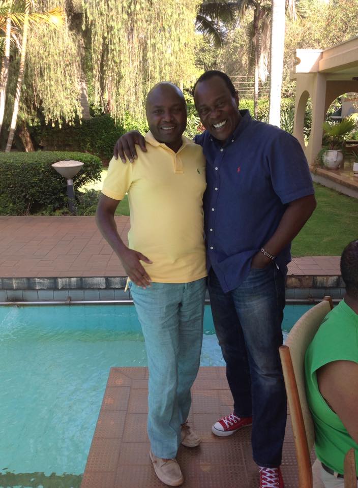 Jeff Koinange and colleague pose for a photo during a party at Chris Kirubi's mansion in 2014.