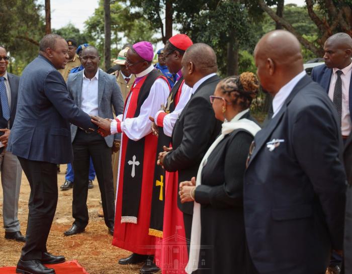 President Uhuru Kenyatta arrives at Karigu-ini Primary School grounds in Murang'a County for the funeral service of the former Cabinet Minister Charles Wanyoike Rubia on Monday, December 30, 2019