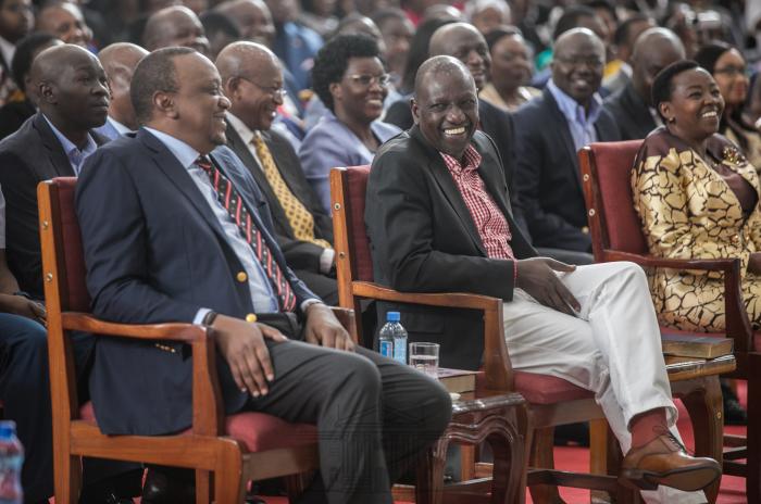 President Uhuru Kenyatta and Deputy President William Ruto at Africa Inland Church (AIC) Milimani in Nairobi on Sunday, January 26