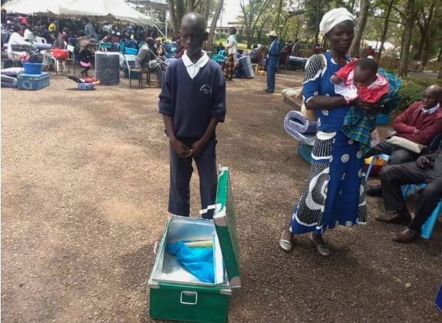 Levis Otieno Rabar and his mother Monica Otieno during the first day at Kanga High School on Monday, January 13.