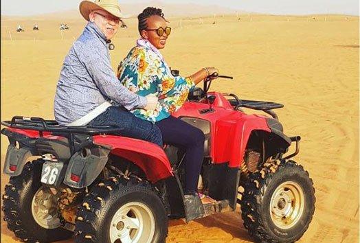 Nominated Senator Isaac Mwaura and his wife pictured riding a quad bike