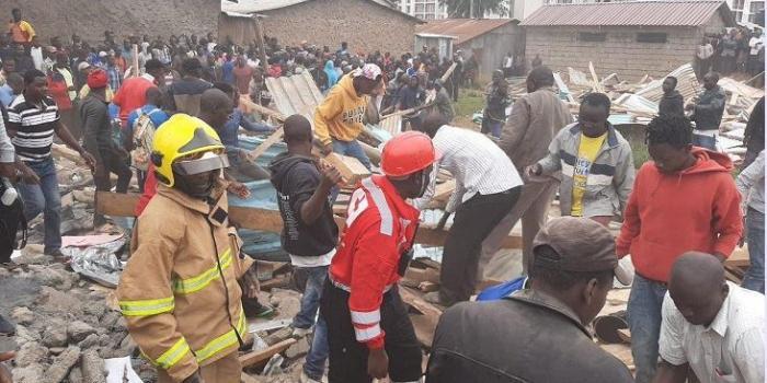 Dagoretti South residents and the Kenya Red Cross Society workers during the rescue efforts of pupils trapped after a two-storey building collapsed at Precious Talent School on Monday, September 23.